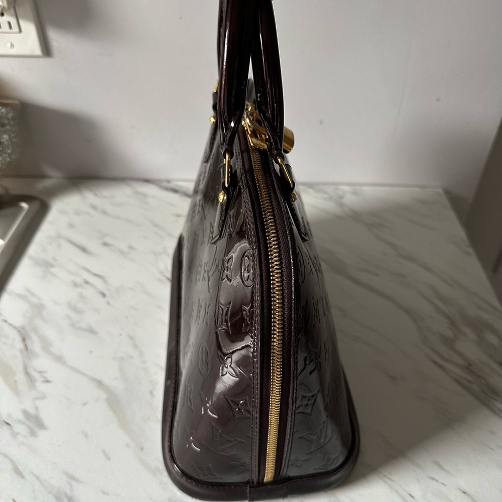 Louis Vuitton- Alma patent leather tote